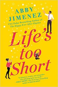 A bright yellow illustrated book cover of Life's Too Short by Abby Jimenez with a man in slacks and a button down at the top right, reaching for a heart, and a woman in black pants and a red shirt at the bottom left. A dog pokes through the second O of the word TOO.