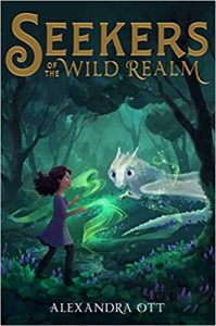 A green illustrated cover of a girl swirling green magic with her hands in a forest and a young, white dragon looking on. The title is Seekers of the Wild Realm. The author is Alexandra Ott.