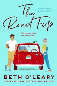 An aqua-colored book cover with an illustrated young man and woman leaning on opposite sides of a red Mini Cooper with luggage inside. She's wearing overalls and has short, purple hair. He's in khaki shorts and a white t-shirt with brown hair, looking over the roof of the car at her. The title is The Road Trip in script at the top with the author, Beth O'Leary printed at the bottom. The tag line reads, "This is going to be one bumpy ride."